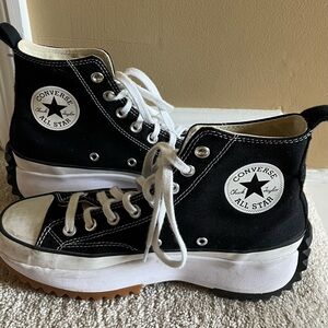 Converse Black and White High-Top Sneakers with Iconic Design